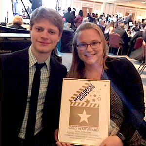 CNMA alumni Joshua McCrary (co-director) and Christian Webster (writer/producer) receiving the Gold Remi Award for More Than Home.